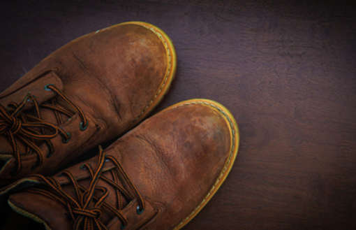 Suede shoes that have been damaged and discoloured.